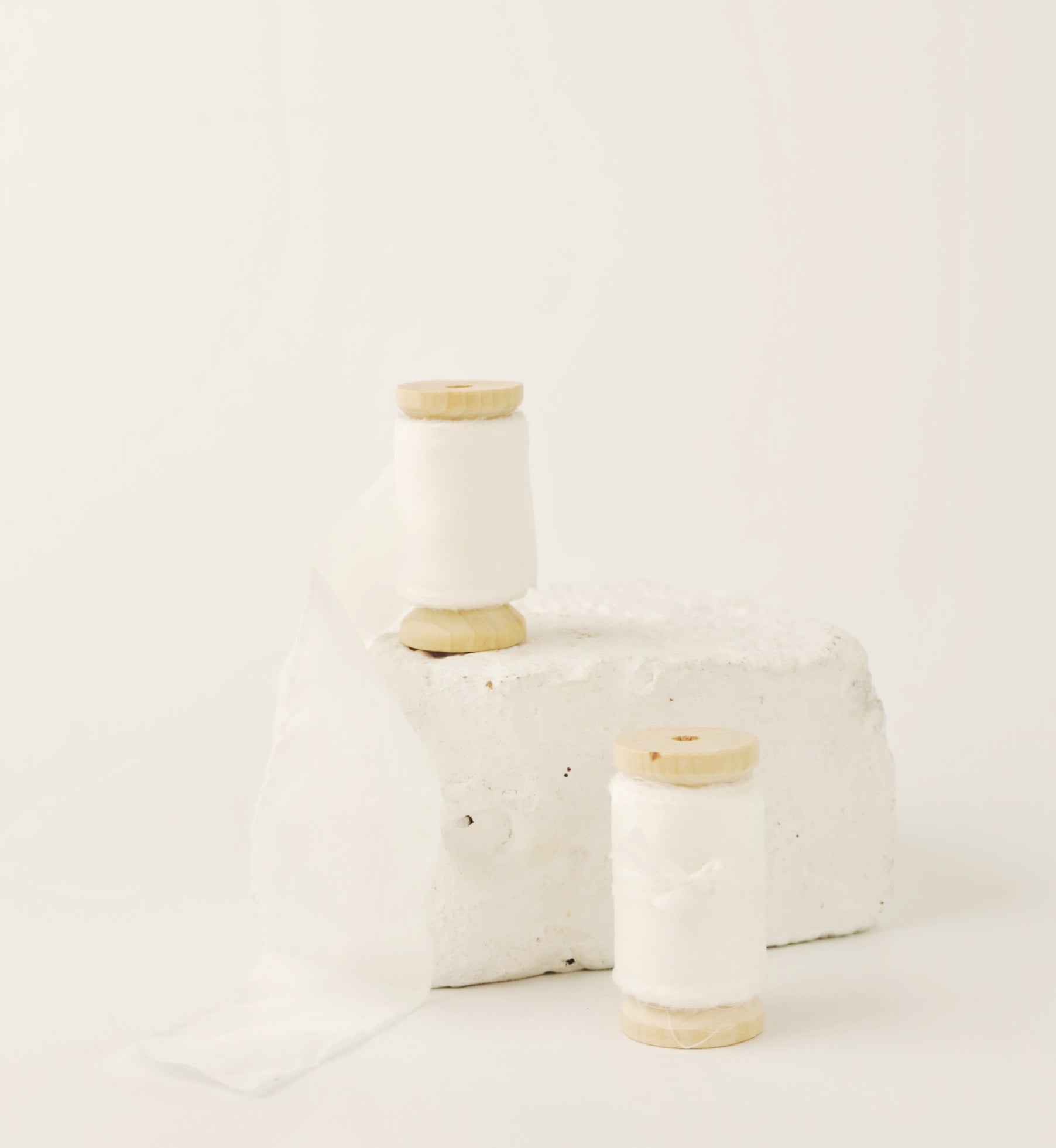 White Silk Habotai on wooden spool for hand tied bridal bouquets and wedding stationary